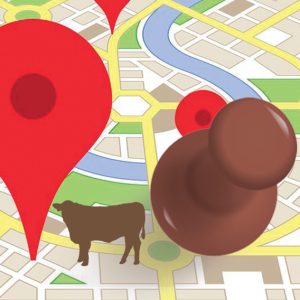 pin and cow graphic on map